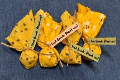 picture of seed bomb wrapped in yellow bee material