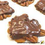 Homemade chocolate honey caramel turtles on sheet pan image.