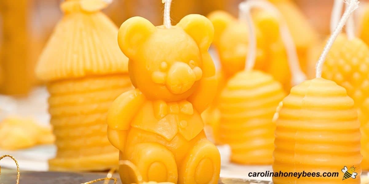 Various shapes of molded beeswax candles image.