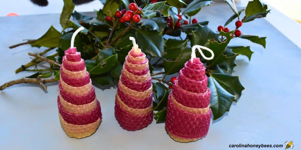 Christmas tree candles made from cut wax sheets.