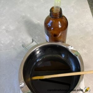 Essential oils ready to add to black walnut salve ingredients.