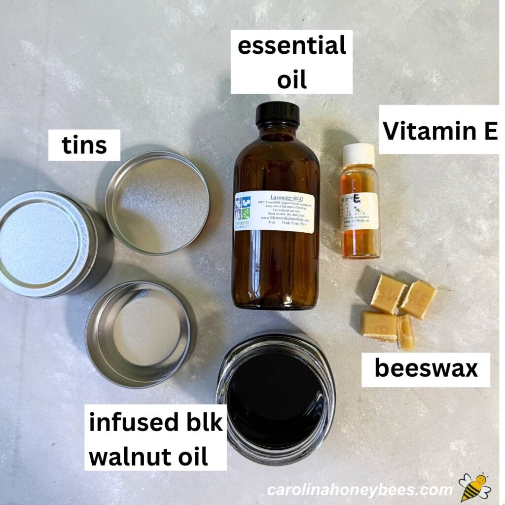Basic supplies (tins, beeswax, jar, infused black walnut oil and essential oils for making salve.